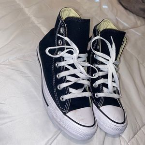 Black and white high top converse